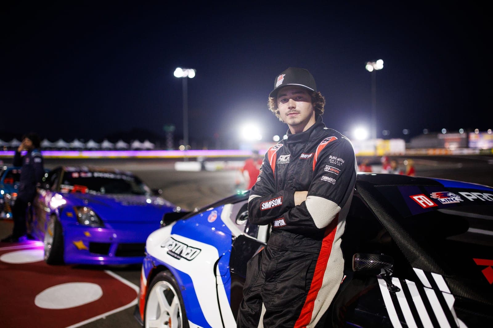 Ayden Copham beside his Forsberg Racing PROSPEC Nissan Z at Las Vegas