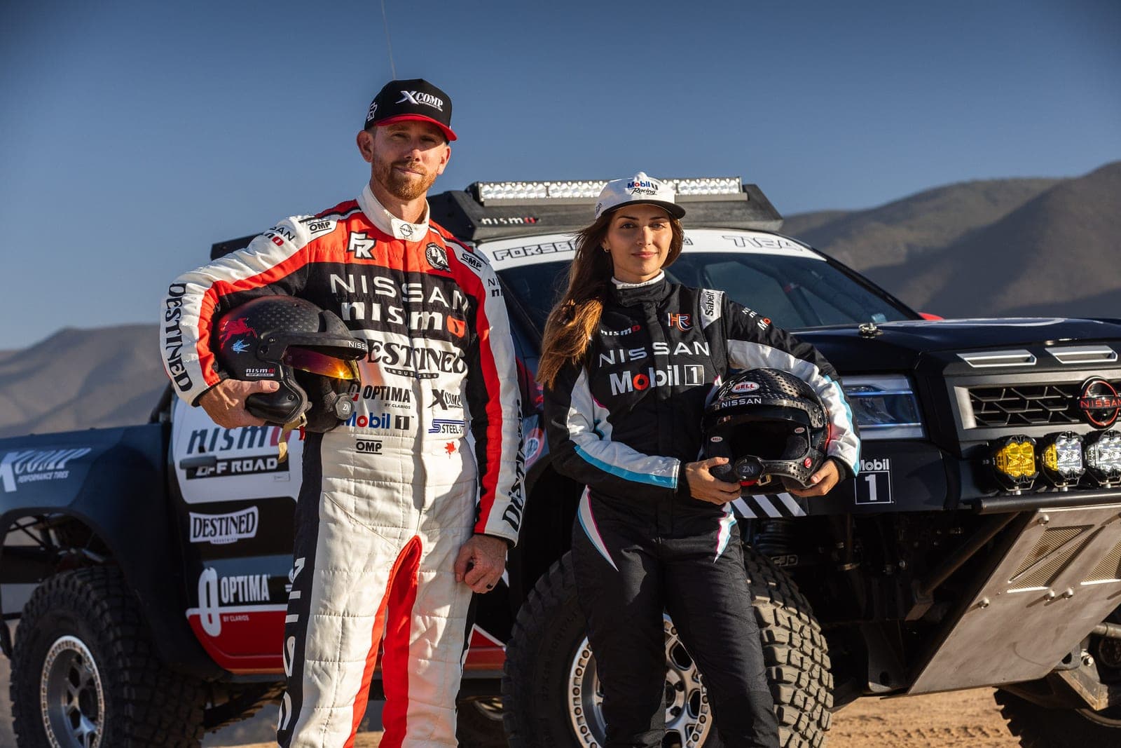 Chris Forsberg and Emelia Hartford with their Nissan Frontier race truck